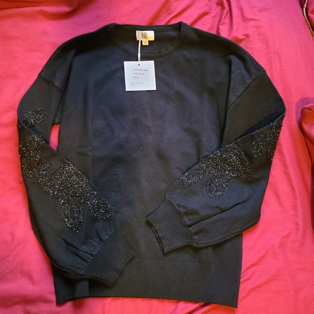YAL NY ladies sweater with designed on sleeves nwt